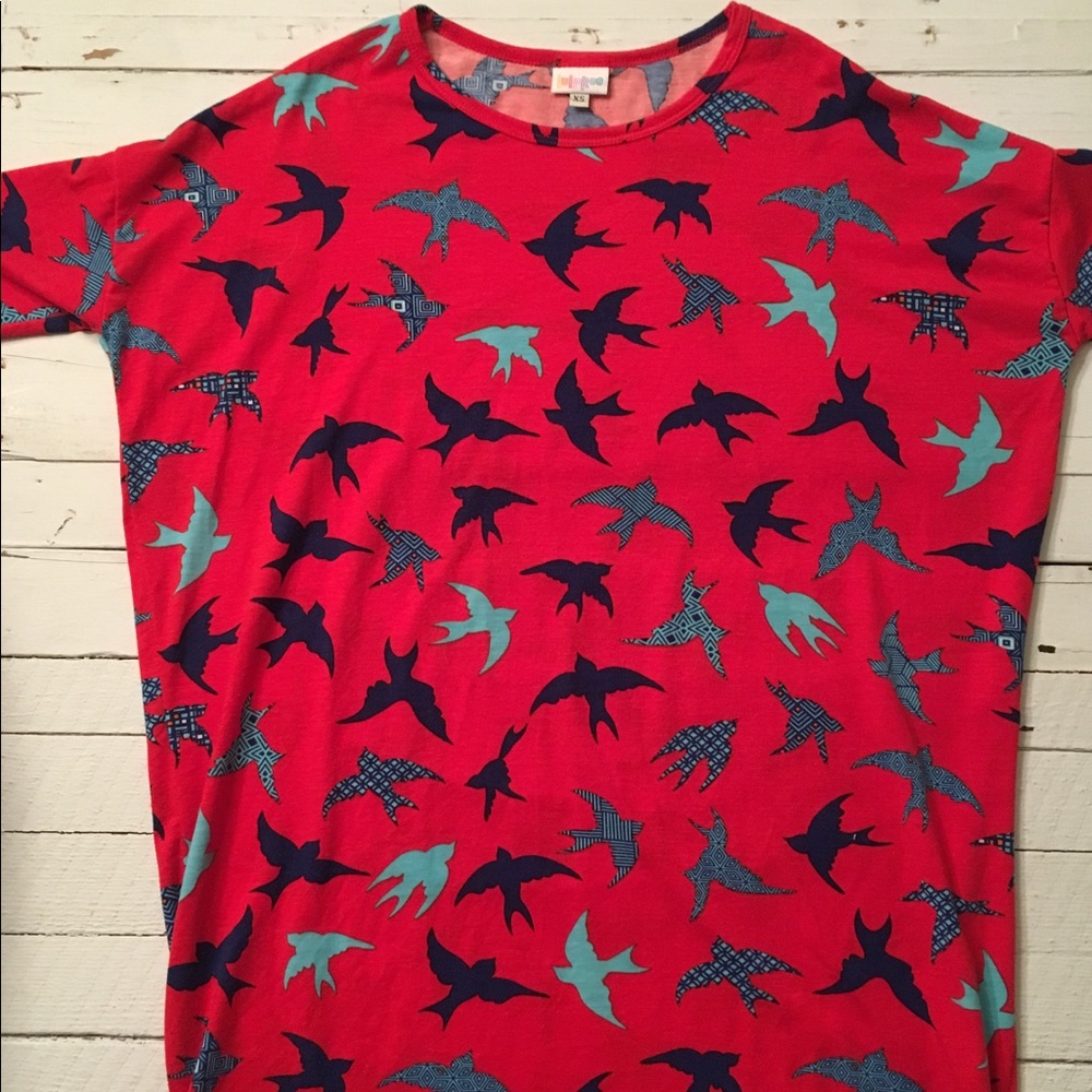 LuLaRoe XS Irma Tunic. Red with multicolor birds.